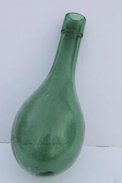 catalog photo of old round bottom bottle, vintage green glass wine bottle or water bottle?