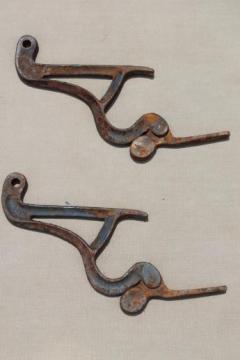 catalog photo of old rusty  iron hardware ladder hooks,  vintage farm primitive tool