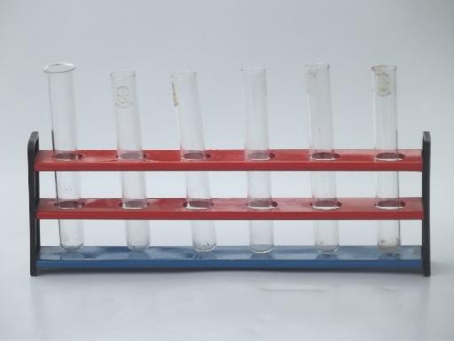 photo of old school test tube racks, metal labware stands for chemistry vials #7