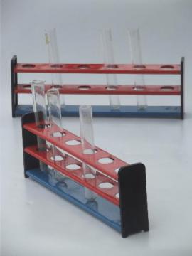 catalog photo of old school test tube racks, metal labware stands for chemistry vials