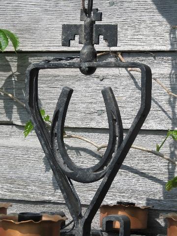 photo of old south-west horseshoes & spurs hanging lamp, retro cast metal light #4