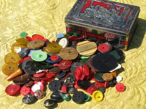 photo of old toffee tin full of vintage bakelite and plastic buttons and buckles #1