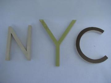 catalog photo of old vintage store sign wood letters spelling NYC word wall art display