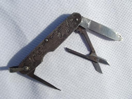 photo of old western tooled sterling silver pocket knife, vintage cowboy #1