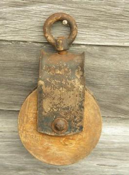 catalog photo of old wood and iron barn hayloft rope pulley, vintage farm primitive