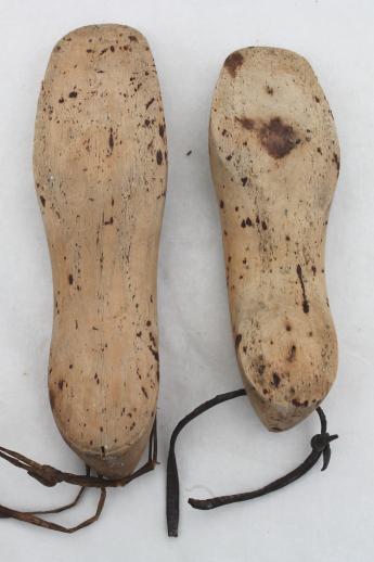 photo of old wooden feet, foot shaped wood blocks to form shoes or slippers, vintage shoe stretchers #3