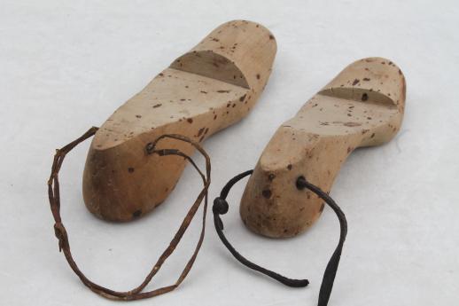 photo of old wooden feet, foot shaped wood blocks to form shoes or slippers, vintage shoe stretchers #5