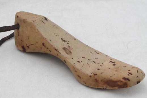 photo of old wooden feet, foot shaped wood blocks to form shoes or slippers, vintage shoe stretchers #6