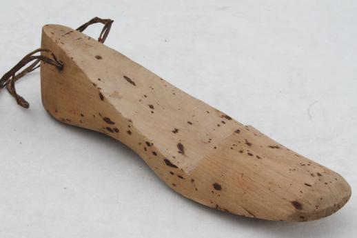 photo of old wooden feet, foot shaped wood blocks to form shoes or slippers, vintage shoe stretchers #7