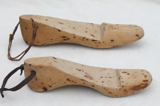 photo of old wooden feet, foot shaped wood blocks to form shoes or slippers, vintage shoe stretchers #8