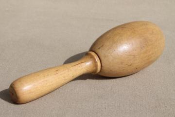 catalog photo of old wooden sock darner, vintage wood darning egg for mending knitted socks