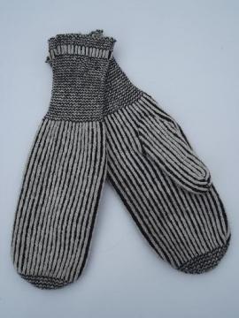 catalog photo of old woolen mittens, knitted navy blue and natural white wool, chopper style