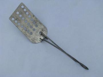 catalog photo of old-fashioned vintage all metal pancake turner / flipper spatula