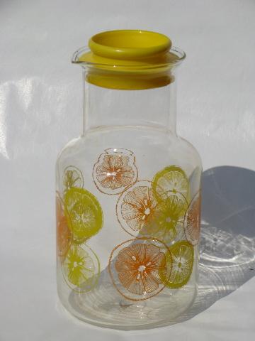 photo of orange and lemon slice print Pyrex glass juice / tea bottle carafe #1