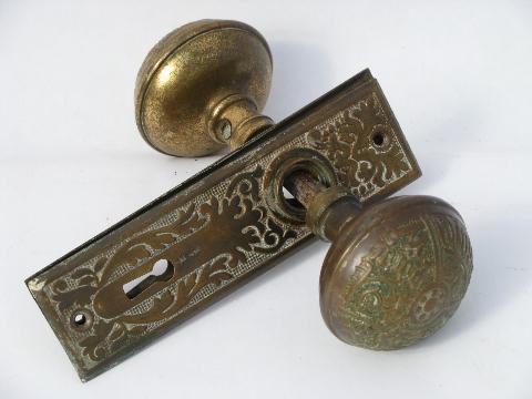 photo of ornate antique Arts and Crafts brass door hardware, doorknobs & plates #1