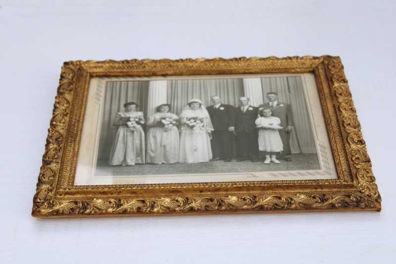 photo of ornate antique gold gesso picture frame w/ original wood plank back, holds vintage wedding photo #1