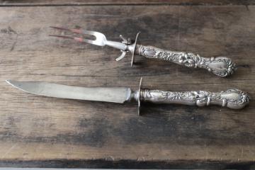 catalog photo of ornate antique silver handled carving set knife and fork, engraved December 25th 1906