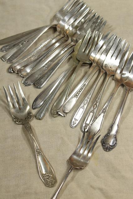 photo of ornate antique silverware, collection of large serving forks, vintage silver plate flatware #1