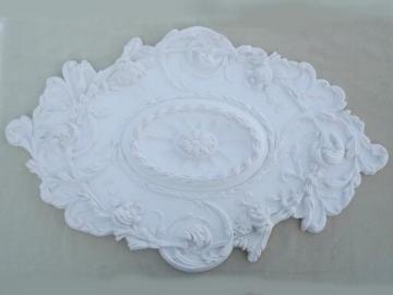 catalog photo of ornate architectural molding ceiling medallion, ceiling rose in faux plaster