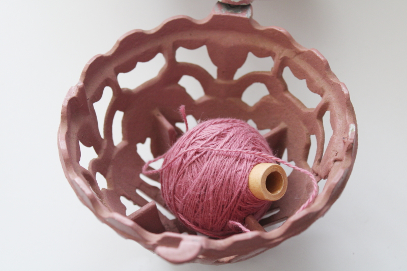 photo of ornate cast metal string holder, vintage pink painted aluminum twine ball stand or hanger #4