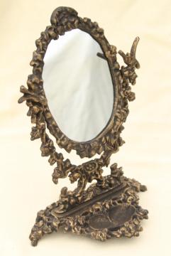 ornate old cast iron tilt mirror on stand, shaving or vanity table mirror