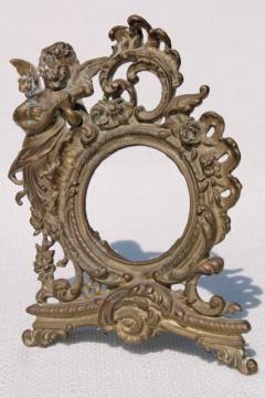 catalog photo of ornate rococo style brass frame w/ cherub angel, vintage antique reproduction