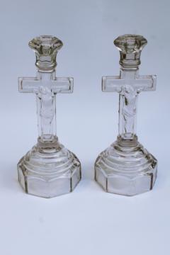 catalog photo of pair antique pressed glass crucifix candlesticks Jesus on the cross, altar candle holders 