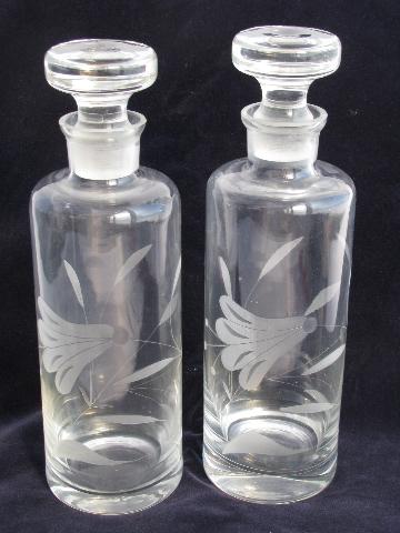 photo of pair glass decanter bottles w/ ground stoppers, etched trumpet flowers #1