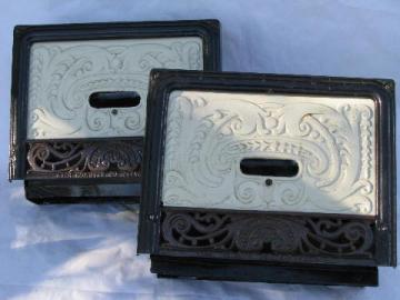 catalog photo of pair of antique architectural heating registers, ornate cast iron grates