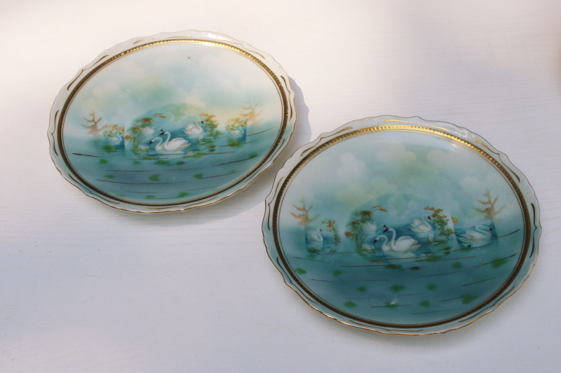 photo of pair of antique china plates, white swans on aqua lake, late 1800s Germany porcelain #1