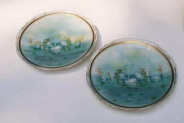 pair of antique china plates, white swans on aqua lake, late 1800s Germany porcelain 