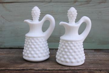 catalog photo of pair of vintage Fenton hobnail milk glass cruets w/ stoppers, opaque white milk glass 