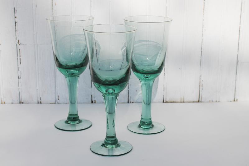 photo of pale green recycled glass water goblets or wine glasses, hand blown glass #1