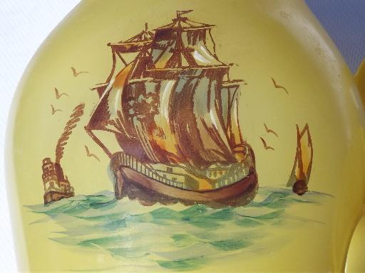 photo of pre depression glass vintage covered pitcher, yellow overlay w/ painted ship #6