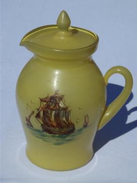 catalog photo of pre depression glass vintage covered pitcher, yellow overlay w/ painted ship