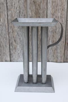 catalog photo of primitive candle mold, zinc metal mold for poured candles, long wax tapers