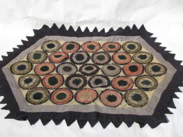 catalog photo of primitive early american antique hand-stitched penny bullseye rug