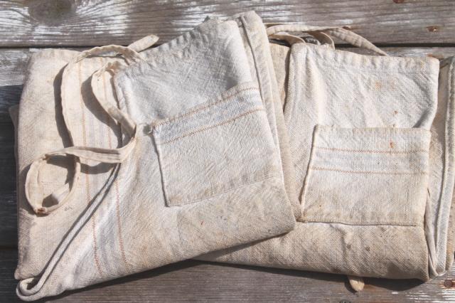 photo of primitive grubby homespun work apron lot, antique vintage cotton flour sack fabric aprons #9