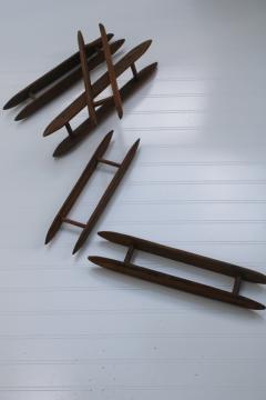 catalog photo of primitive handmade wood shuttles for weaving loom or making rugs, rag or yarn winder spools