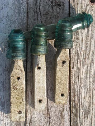 photo of primitive harness or coat hooks, old barn board wood pegs w/ antique glass insulators #1