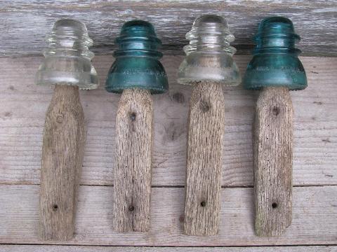 photo of primitive harrness or coat hooks, old barn board wood pegs w/ antique glass insulators #1