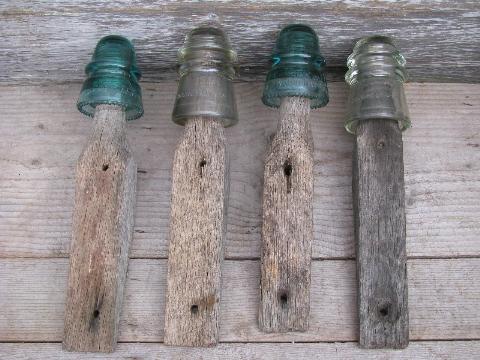 photo of primitive harrness or coat hooks, old barn board wood pegs w/ antique glass insulators #1