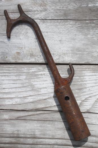 photo of primitive iron tobacco pole, rusty iron farm tool for handling drying tobacco  #2