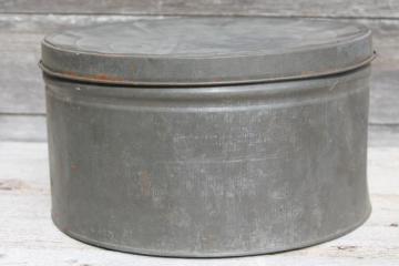 catalog photo of primitive old antique metal cracker box or cake tin, large round hatbox shape