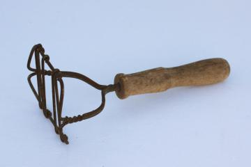 catalog photo of primitive old antique potato masher, wood handle wire kitchen tool, vintage farmhouse