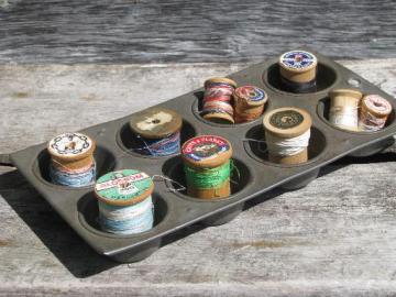 catalog photo of primitive old baking pan, cupcake / muffin cups for storage and sorting