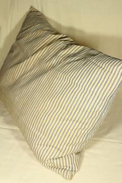 catalog photo of primitive old chicken feather pillow in vintage indigo blue cotton ticking fabric