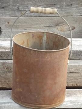 catalog photo of primitive old farm bucket w/ wood handle, rusty steel pail for flower pot