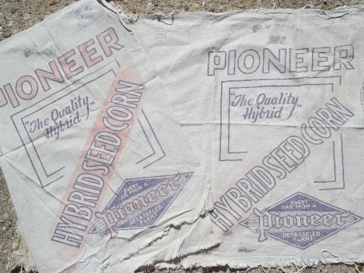 photo of primitive old farm seed corn grain sacks, vintage Pioneer graphics #1