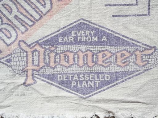 photo of primitive old farm seed corn grain sacks, vintage Pioneer graphics #2